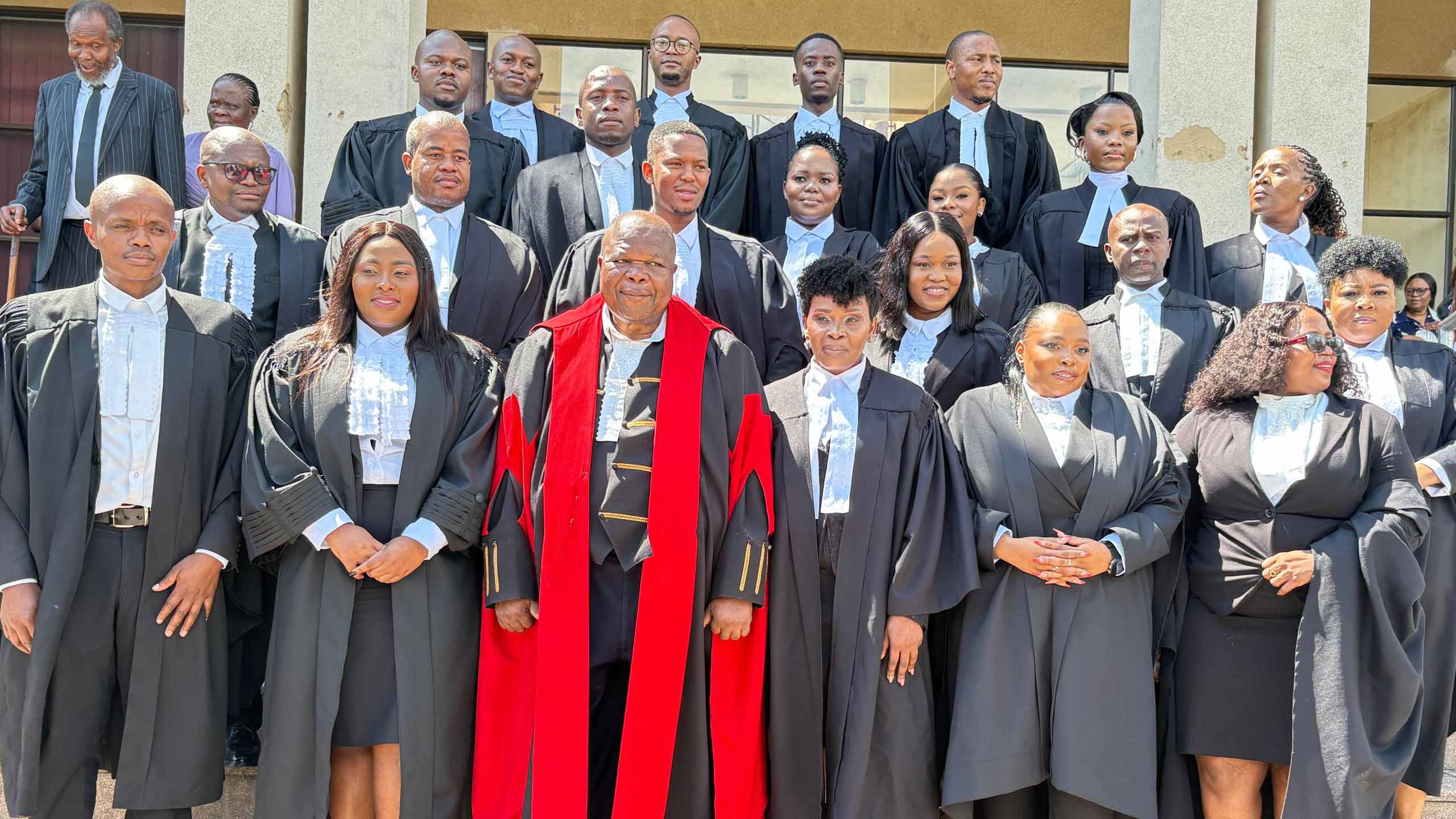 Chief Justice Bheki Maphalala with the newly-sworn in attorneys after their admission yesterday at the High Court. (Pic: Kwanele Dlamini)